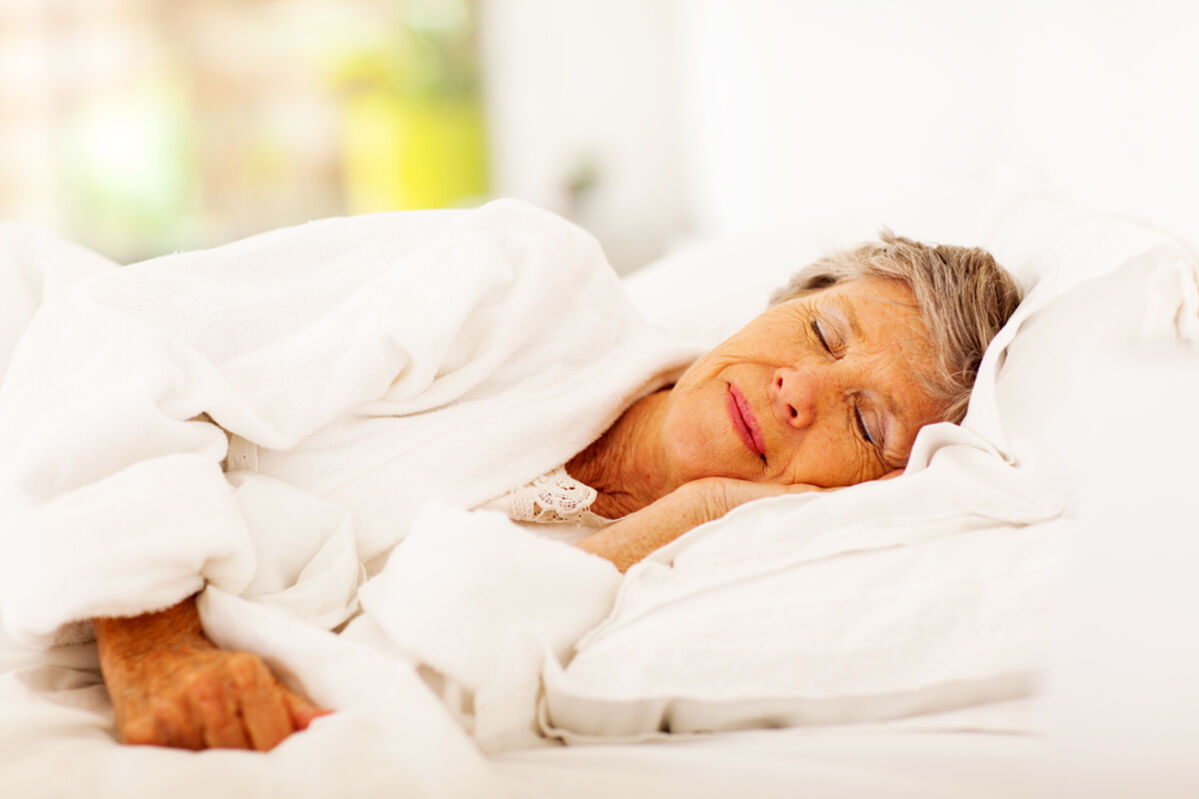 Woman asleep in bed