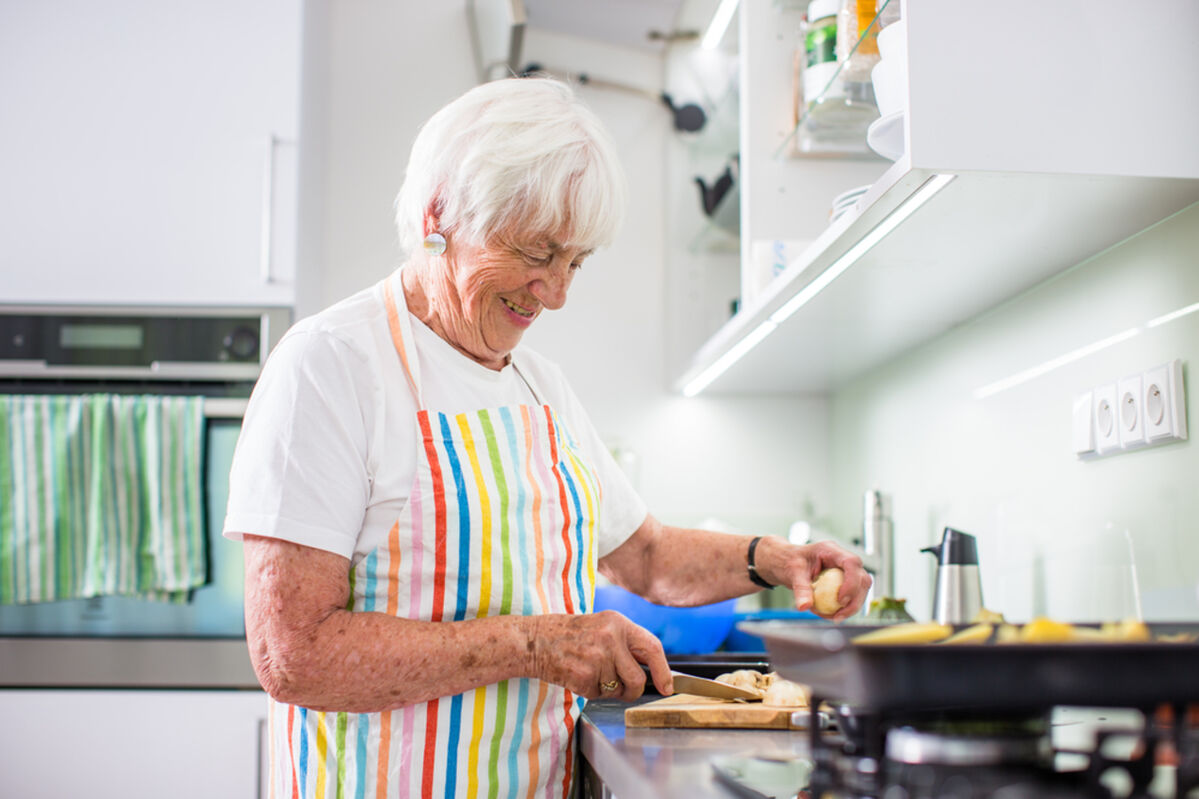 Lady cooking in the kitchen