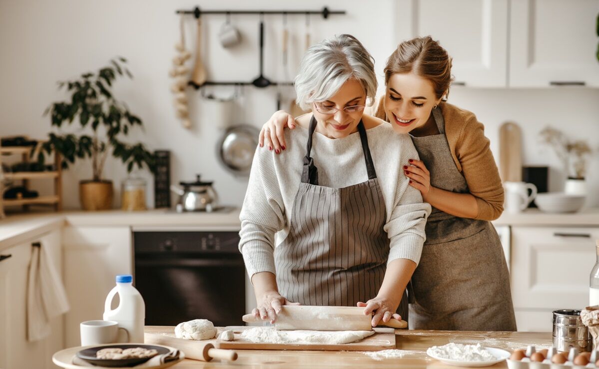 A mother and daughter baking